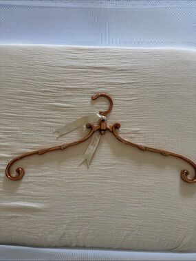 Elegant Decorative Metal Hanger in Copper
